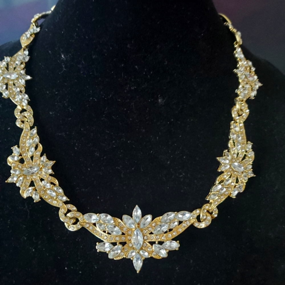 Gold tone bib necklace w/rhinestones